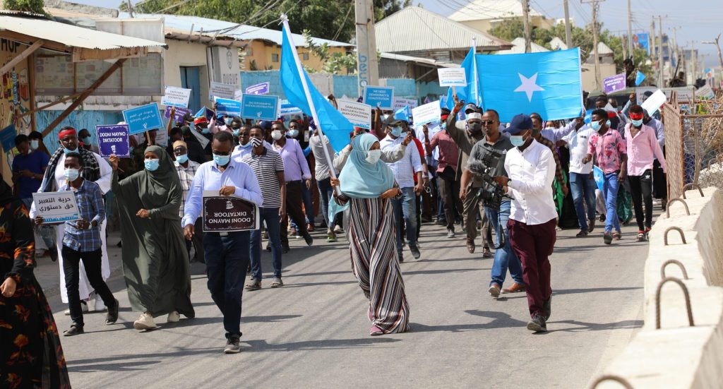 Supporters of different opposition presidential candidates demonstrate in Mogadishu on February 19, 2021.
