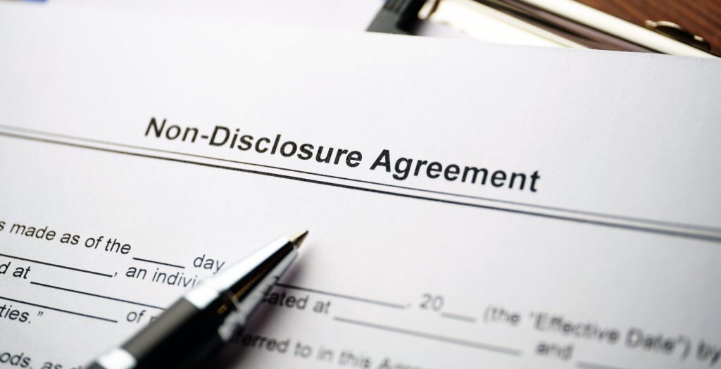 Non-Disclosure Agreement on paper close up