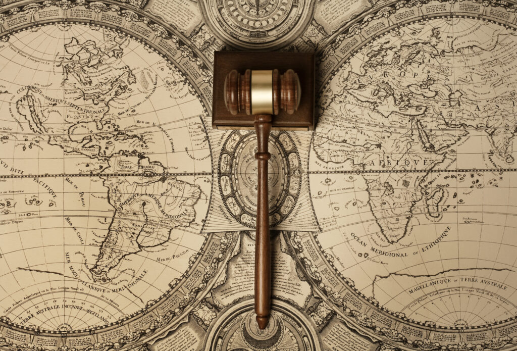 Gavel on an old world map