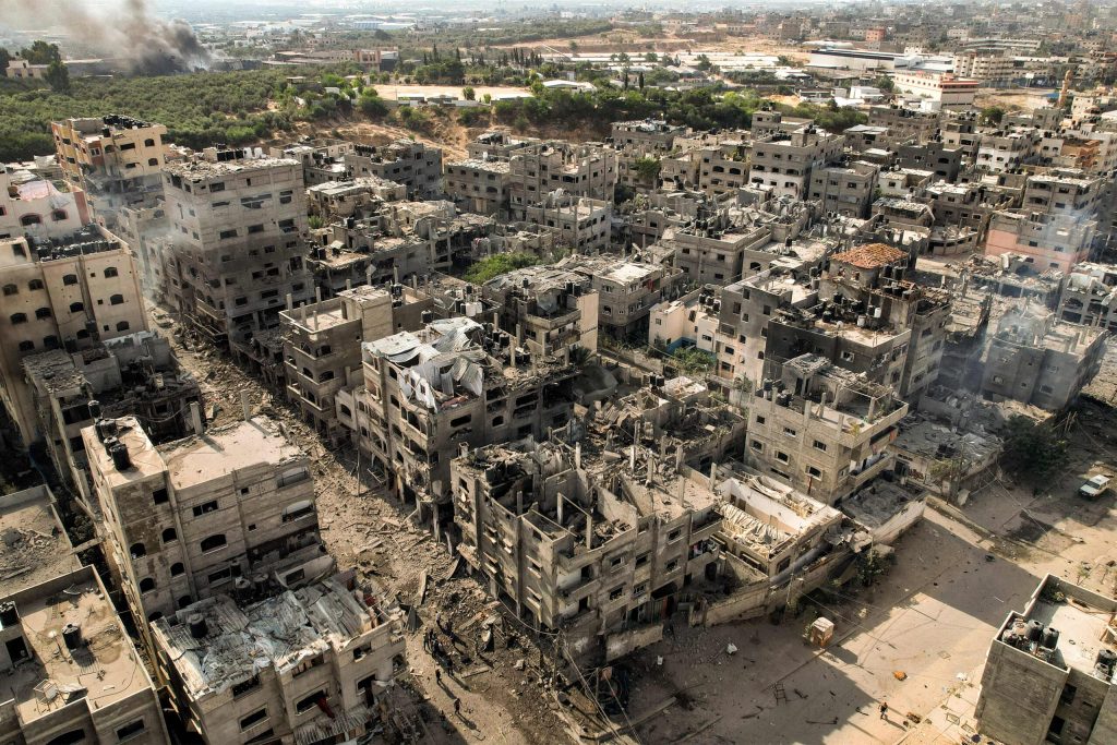 The photo shows destroyed buildings in Gaza City.