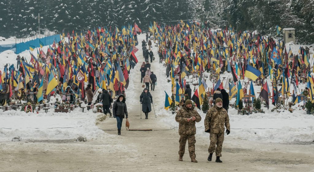 People gather at Lychakiv Cemetery to commemorate the fallen Ukrainian soldiers