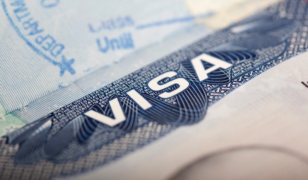 macro of a US visa in a UK passport