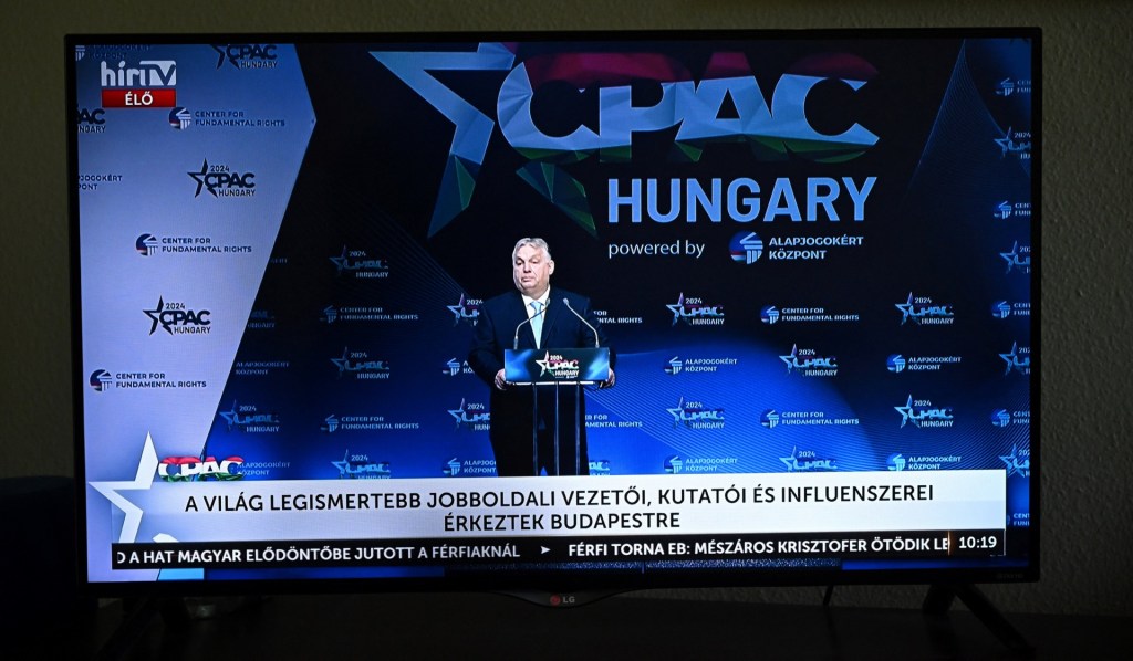A photo taken on April 25, 2024 shows a television transmission of Hungarian Prime Minister Viktor Orban