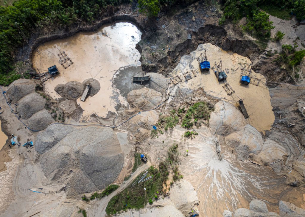 Aerial picture of dredges at an illegal gold mining area in the Madre de Dios department, in Peru's southeastern Amazon region, on May 31, 2024. Illegal exploitation is ruthless, despite law enforcement prosecution in Madre de Dios, in southeastern Peru. (Photo by ERNESTO BENAVIDES/AFP via Getty Images)