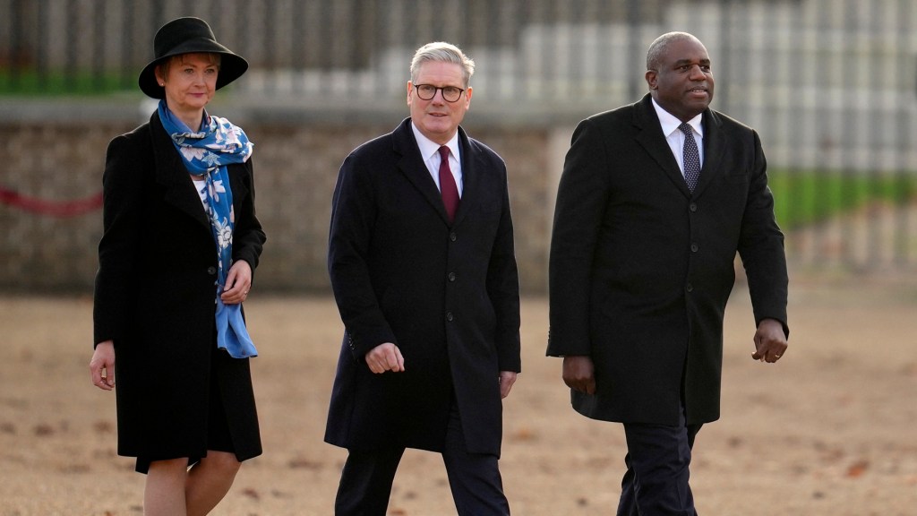 Britain's Prime Minister Keir Starmer, Britain's Secretary of State for Foreign and Commonwealth Affairs Yvette Cooper, and Britain's Deputy Prim Minister David Lammy. (Photo by KIN CHEUNG/POOL/AFP via Getty Images)