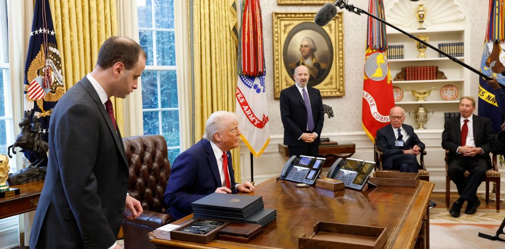 U.S. President Donald Trump speaks to reporters in the Oval Office of the White House