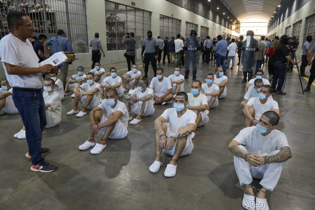 Prisoners sit at maximum security penitentiary CECOT (Center for the Compulsory Housing of Terrorism) on April 4, 2025 in Tecoluca, San Vicente, El Salvador. (Photo by Alex Peña/Getty Images)