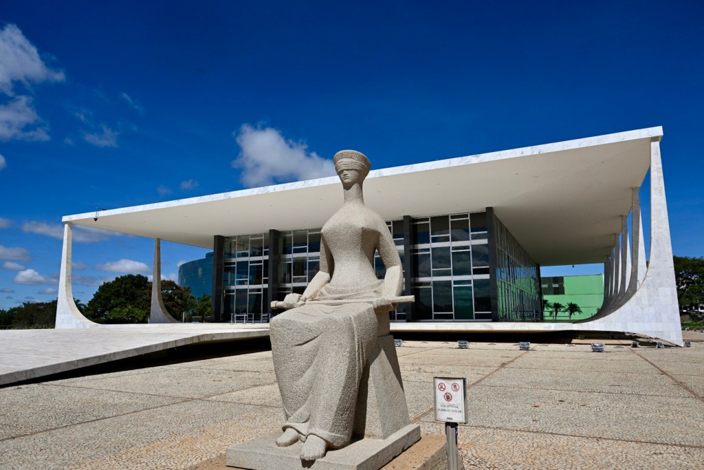 A sculpture is pictured at the entrance of the Brazilian Supreme Court building where the courtrooms are located in Brasilia on May 19, 2025. (Photo by EVARISTO SA/AFP via Getty Images)