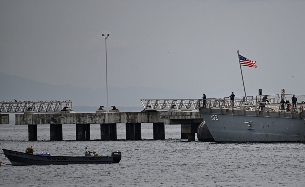 Crew members of the US Navy warship USS Sampson (DDG 102) are pictured at the Amador International Cruise Terminal in Panama City on September 02, 2025. Venezuelan President Nicolas Maduro said on September 1, 2025, that eight US military vessels with 1,200 missiles were targeting his country, which he declared to be in a state of "maximum readiness to defend" itself. (Photo by MARTIN BERNETTI/AFP via Getty Images)
