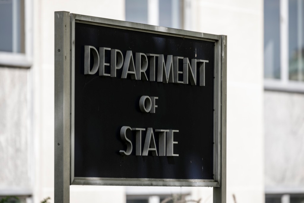 Sign in front of the Department of State in Washington, D.C. (via Getty Images)